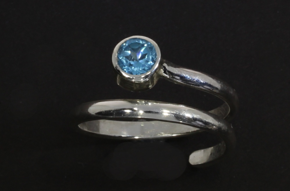 Moonlanding ring with swiss blue topaz