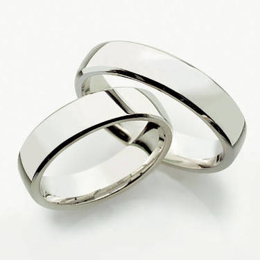 Forlovelses/ gifteringer i sølv. 5 mm brede, lav bue. Pris per par