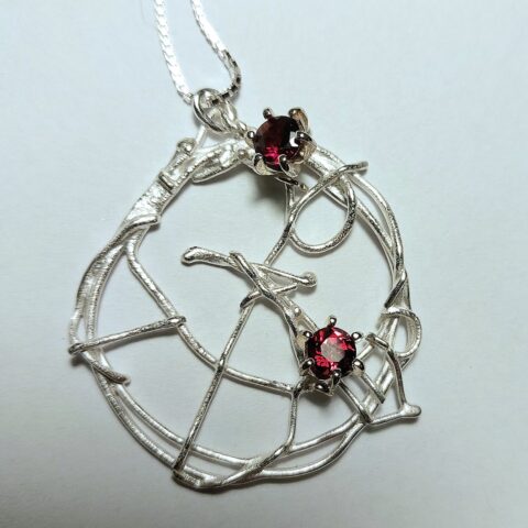 sølv granat smykke